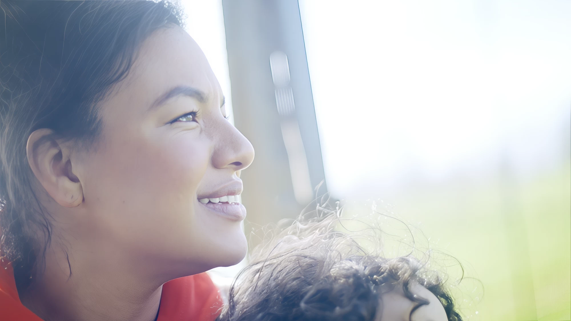 Visit Kent tourism photography — close-up portrait of a smiling parent with child in soft focus